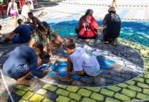 Concurso “Macaé na Torcida” tem inscrições prorrogadas até 14 de junho Foto de crianças e adultos pintando as ruas para a Copa do Mundo